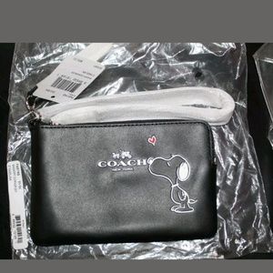COACH x Peanuts Snoopy Leather Wristlet Wallet F65